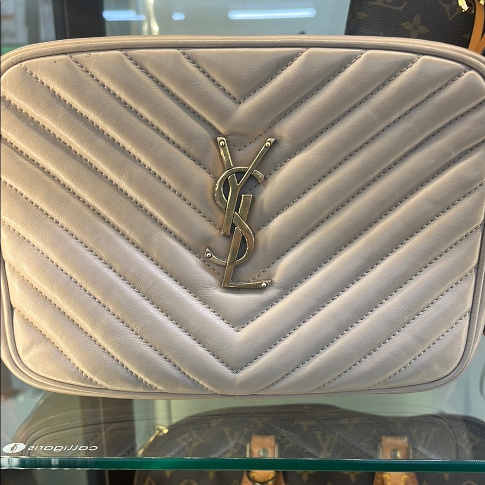 Yves Saint Laurent Cream Quilted Crossbody Bag
Needs cleaning inside